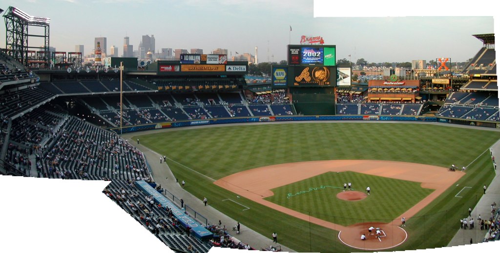 Field being prepared and downtown Atlanta in the background